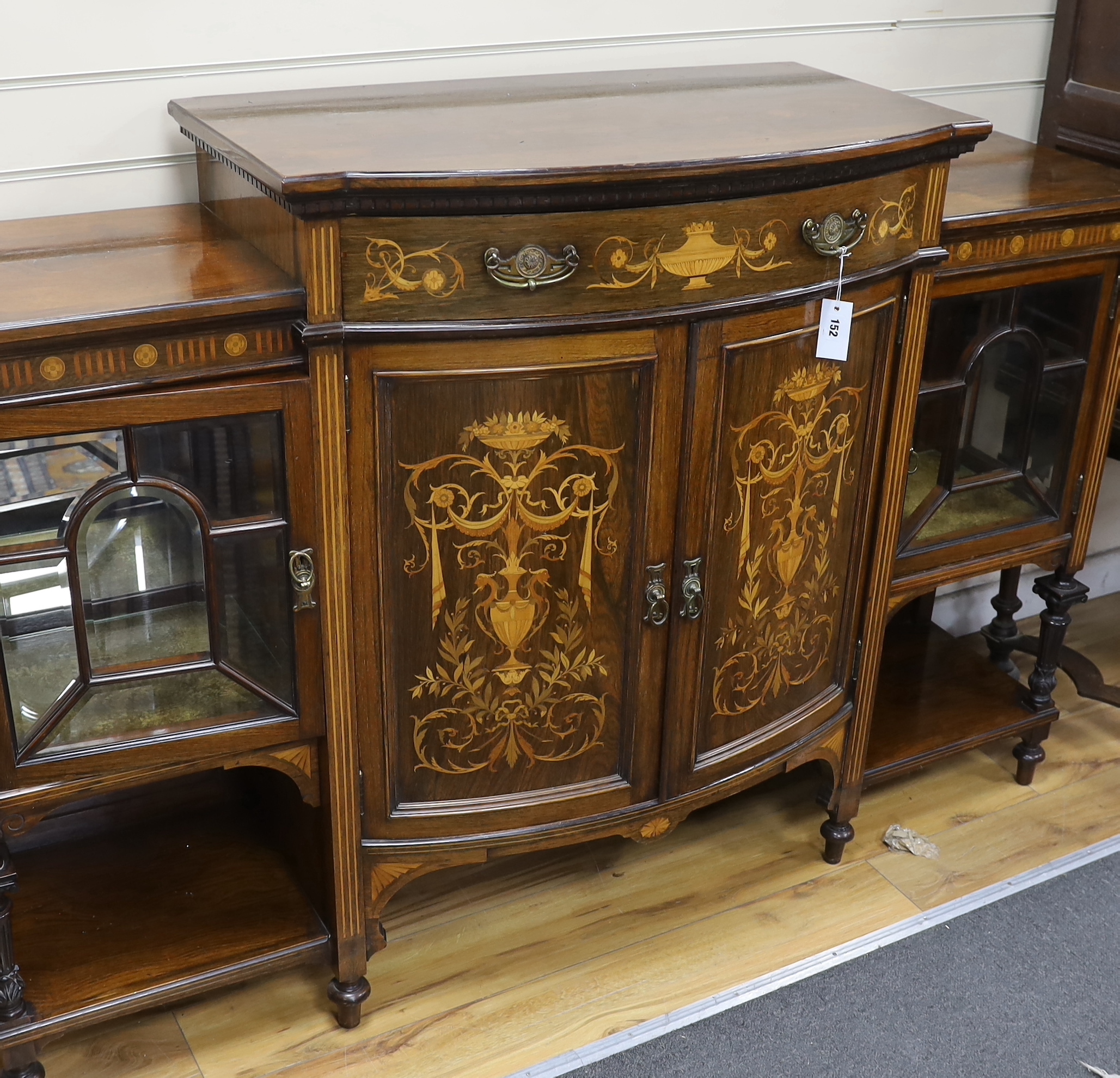 A late Victorian marquetry inlaid rosewood bow front side cabinet, width 168cm, depth 48cm, height 111cm